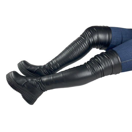 CELESTE PELUCHE BASE CUERO NEGRO