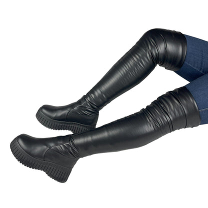 CELESTE PELUCHE BASE CUERO NEGRO